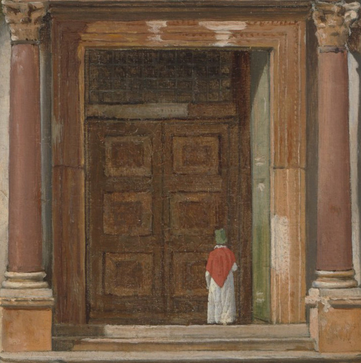 Man by large doors