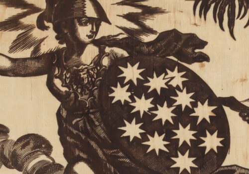 Female figure with shield of stars